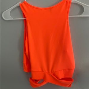 tight fitting crop top with cross over at waist